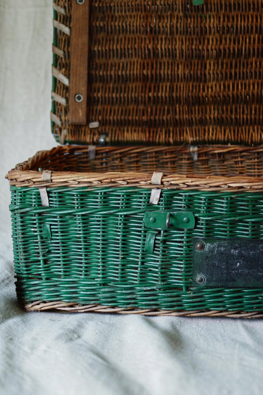 Antique green wicker laundry basket detail photograph 2