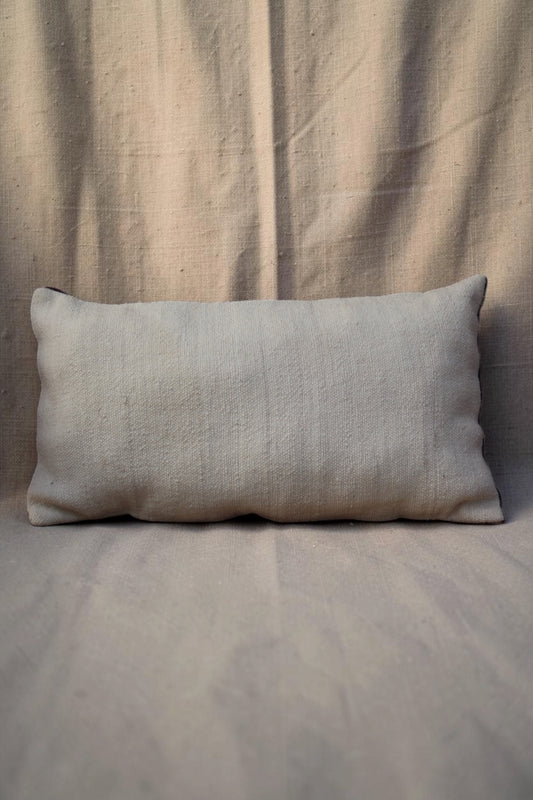 Plain cream reverse of the rectangular Moroccan cushion cover