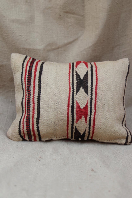 Other side of the cream, red and black geometric Moroccan cushion cover