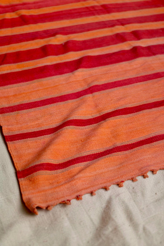 Orange and red stripes with fine grey lines and short knotted fringe