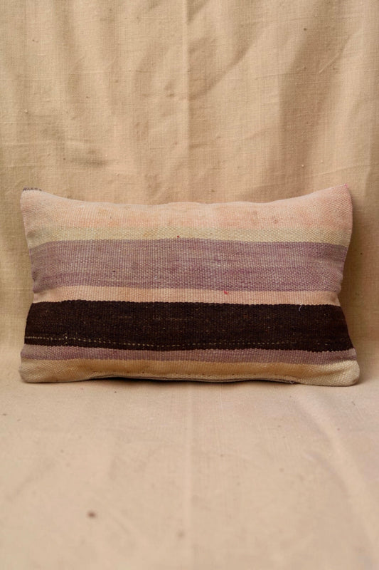 Reverse of the Moroccan cushion cover with broad mauve, cream, pale pink and dark brown stripes