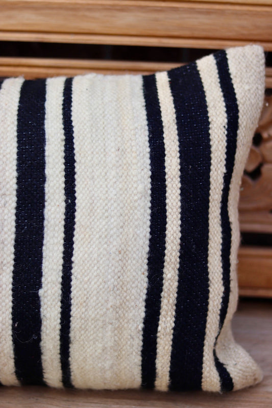 Detail of the navy striped end of the long Moroccan cushion cover
