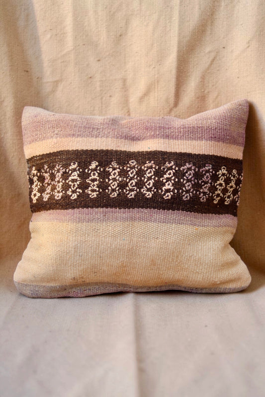 Other side of Moroccan cushion cover with brown patterned band