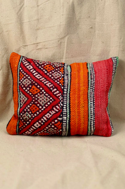 Moroccan cushion cover with red and orange stripes and mint geometric motifs