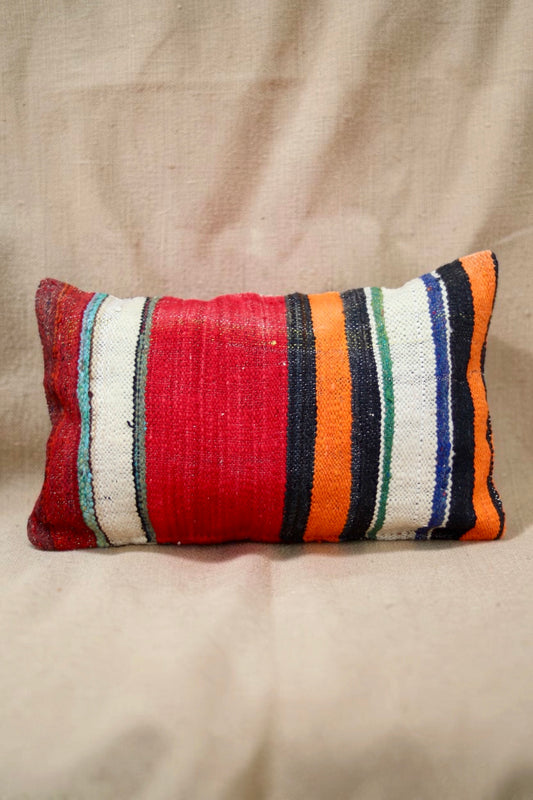 Long Moroccan cushion cover with red, orange, cream and charcoal stripes