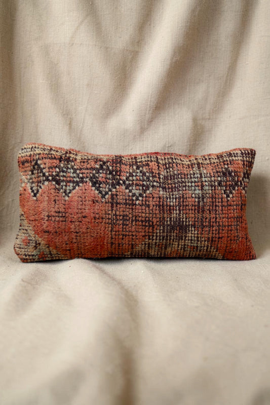 Reverse of double sided coral and grey Moroccan cushion cover