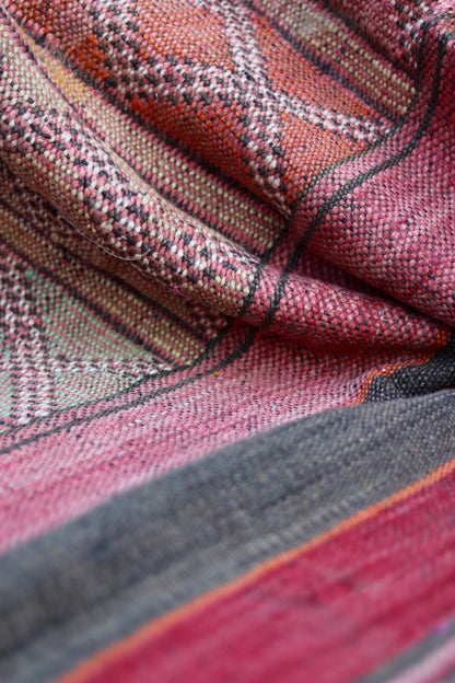 Draped flatweave with geometric motifs and faded striped bands