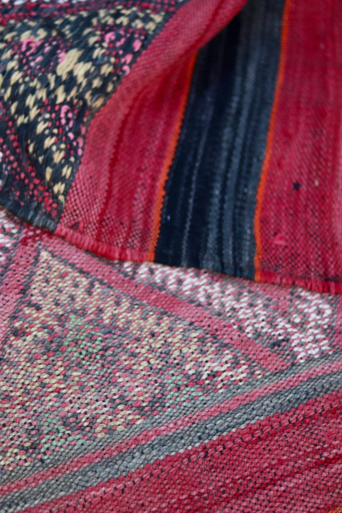 Folded Hanbel showing faded face and stronger colours on the reverse