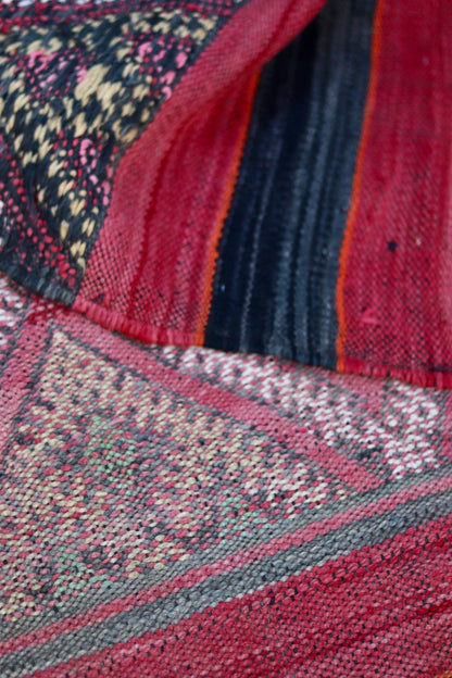 Folded Hanbel showing faded face and stronger colours on the reverse