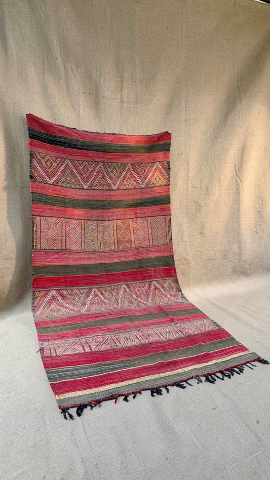 Vintage Moroccan Hanbel rug with faded red and charcoal stripes and geometric patterned bands