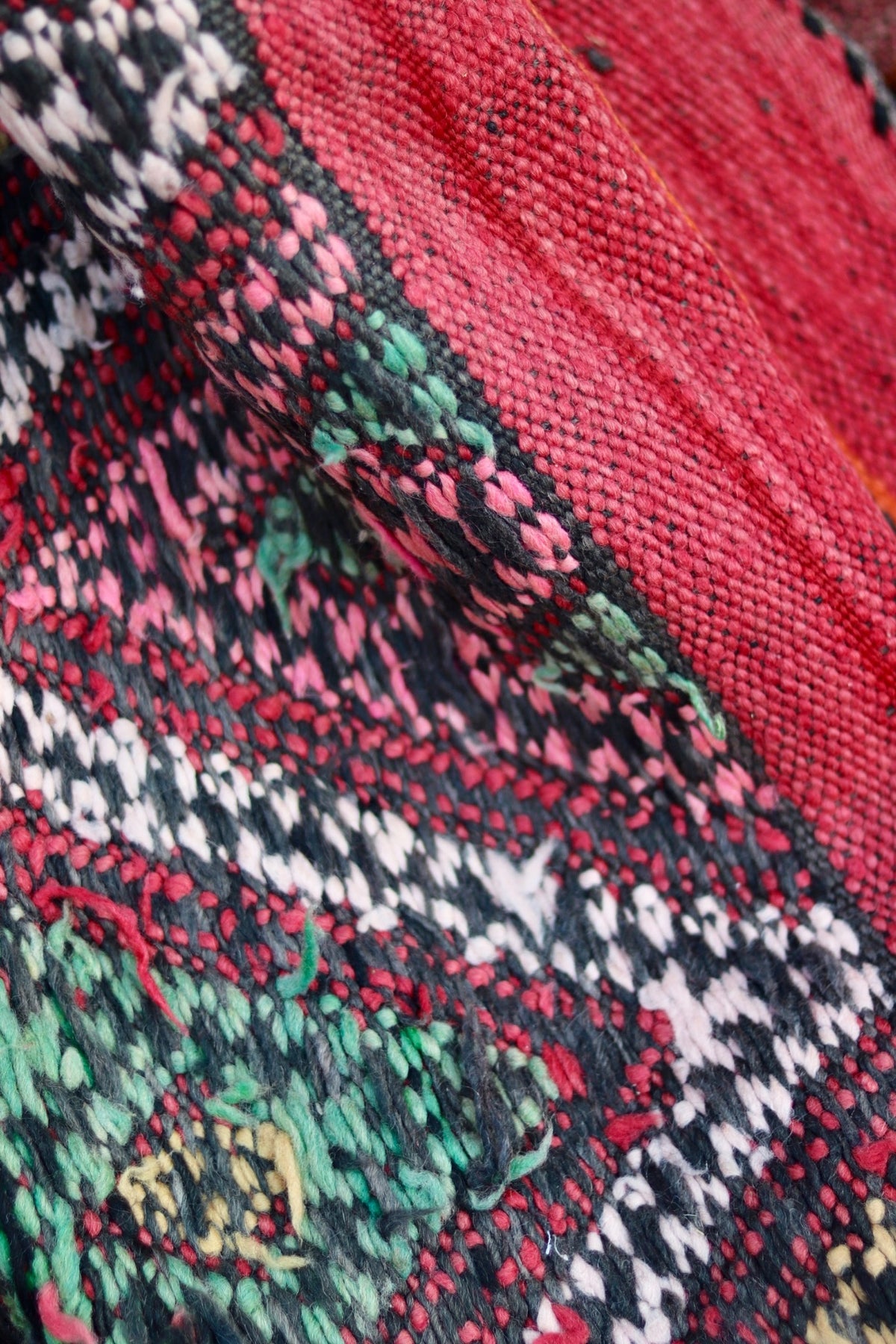 Close-up of the woven reverse and loose threads