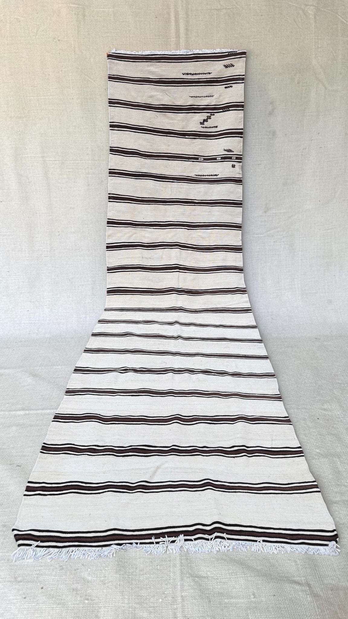 Extra-long cream flatweave runner with dark brown and charcoal stripes, 470 by 130 cm